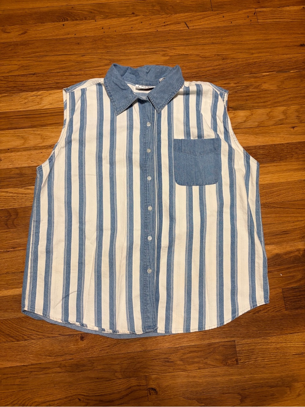 Sleeveless Blue and White Striped Button-Down Shirt with Chest Pocket
